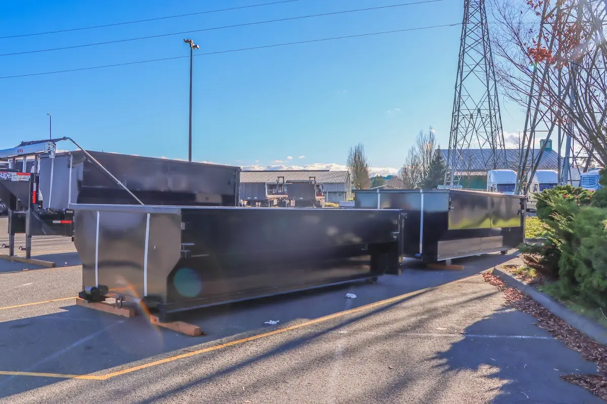 Roll-off dumpster ready for waste disposal at job site for Demolition Dumpster Rental in Alden